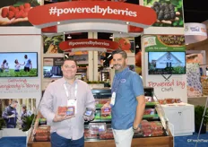 Tom Smith and Jonathan Sparks with California Giant Berry Farms show a selection of the company’s berries.